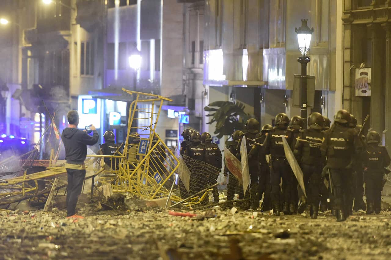 Factories were closed, more than 50 flights at Barcelona's main airport were cancelled and local transport ran reduced services.