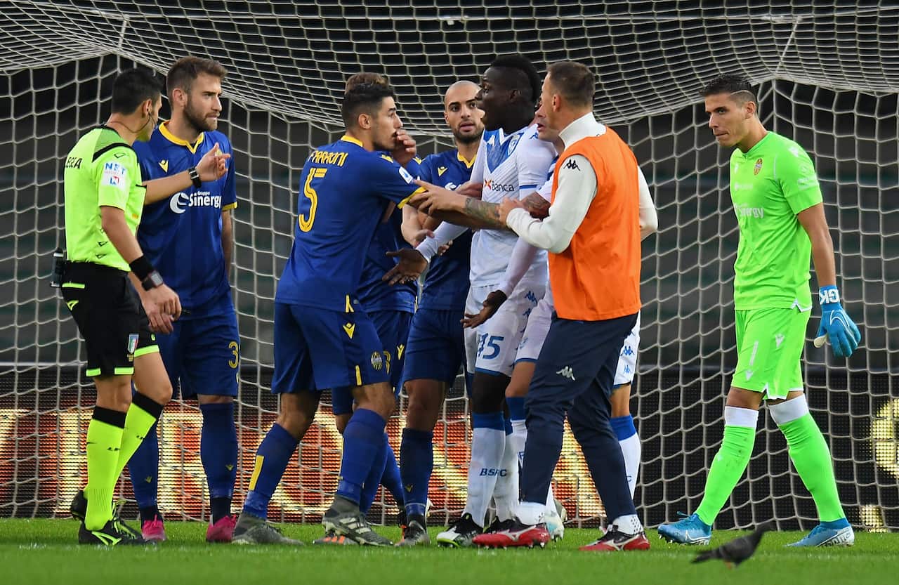 Referee Maurizio Mariani stopped the game and a message was read out over stadium loudspeakers with threats to suspend the match for a longer period.
