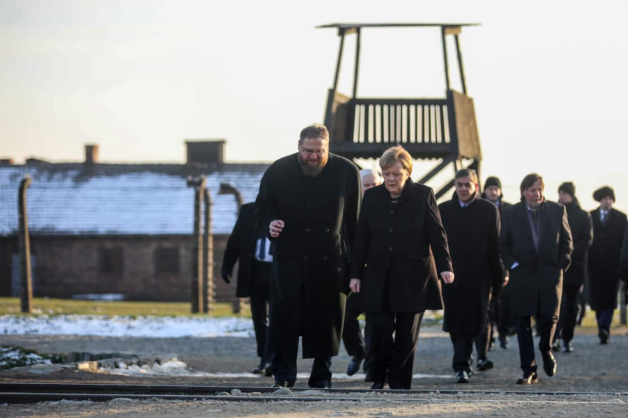 German Chancellor Angela Merkel and Prime Minister of Poland Mateusz Morawiecki visit the former Nazi death camp of Auschwitz.