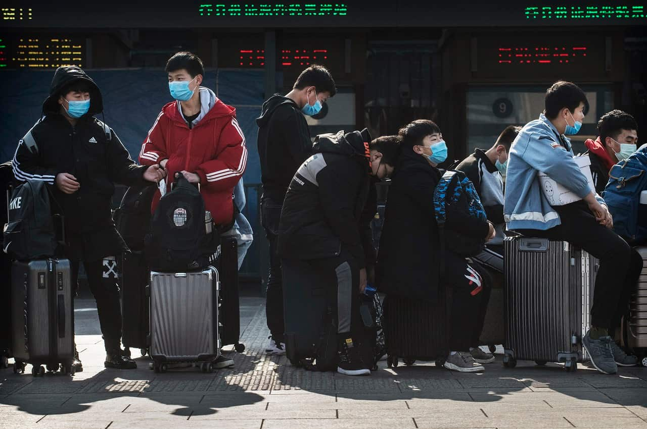 Chinese students wear masks in Beijing.