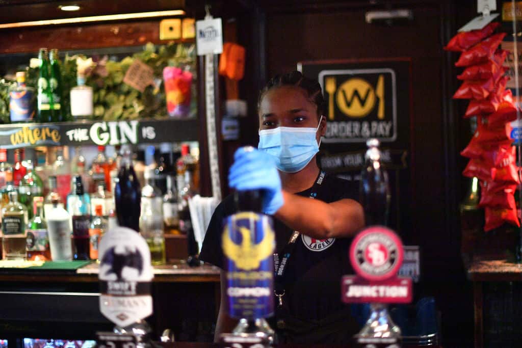 Pubs reopen across England.