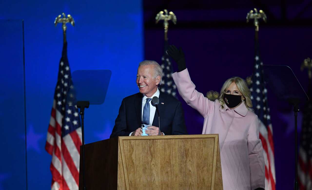 Democratic presidential nominee Joe Biden along with his wife Jill Biden speaks during election night.