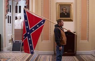 A Donald Trump supporter held the Confederate flag inside the US Capitol building.