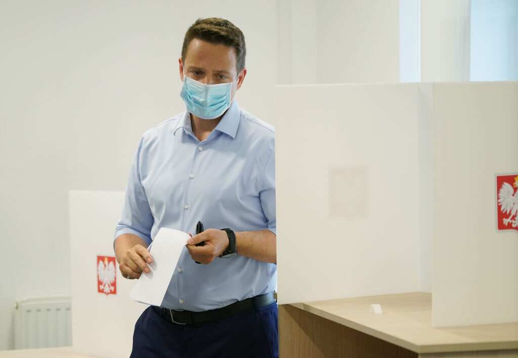 Warsaw's Mayor Rafal Trzaskowski casts his ballot paper
