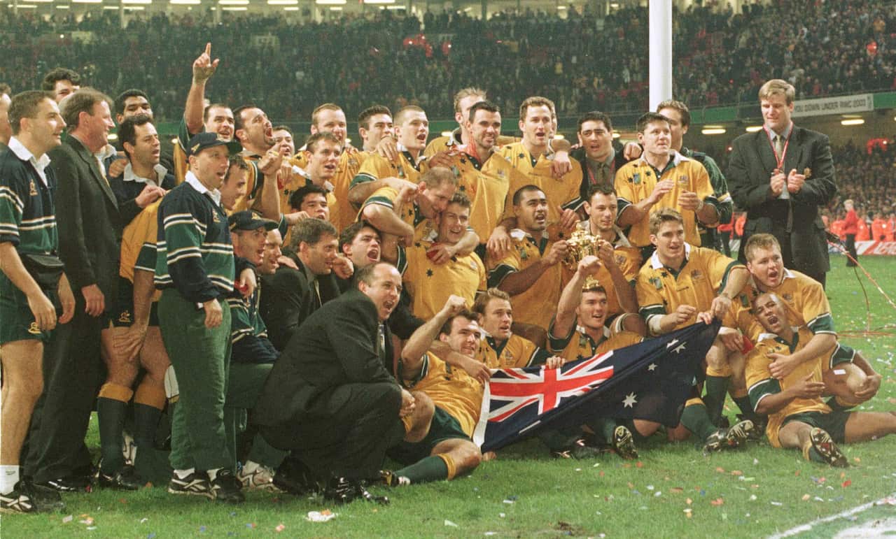 The Wallabies celebrate with the Rugby World Cup
