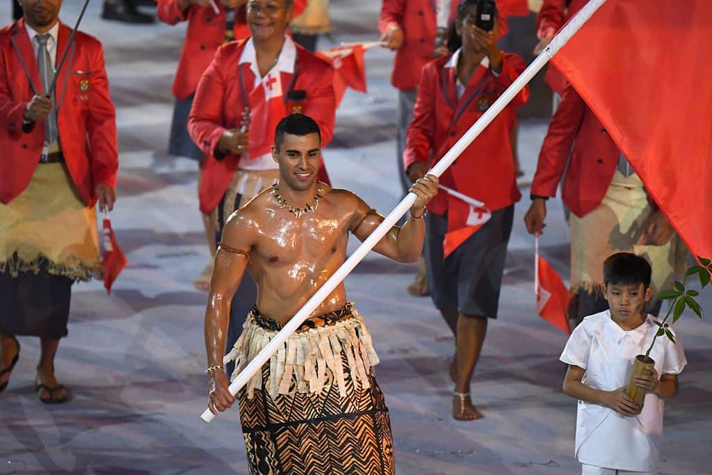Tonga's flagbearer Pita Nikolas Taufatofua leads his delegation during the opening ceremony of the Rio 2016 Olympic Games at the Maracana stadium in Rio de Janeiro on August 5, 2016.
