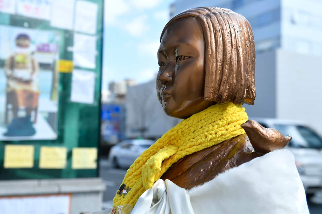 The statue of a girl who is symbolic of 'comfort women' is seen in front of the Japanese consulate-general in Busan, South Korea.