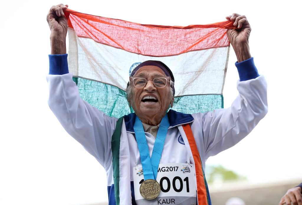 Man Kaur celebrates after winning the 100m sprint at the World Masters Games in Auckland