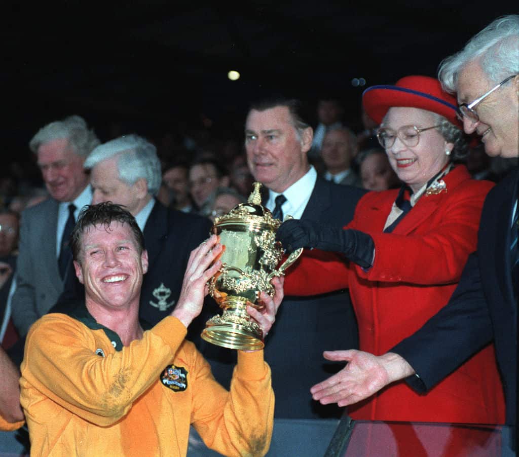 AUSTRALIAN CAPTAIN NICK FARR-JONES SMILES BROADLY AS HE TAKES THE RUBGY WORLD CUP FROM THE QUEEN AT TWICKENHAM.   (Photo by Adam Butler - PA Images/PA Images via Getty Images)