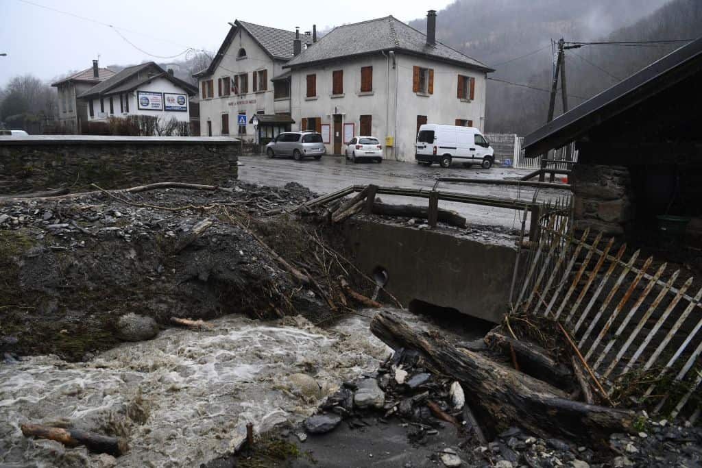 The damaged bank of a river after it overflowed and flooded the area during Storm Eleanor is pictured on January 4, 2018, in the village of Moretel-de-Mailles, near Crets-en-Belledonne, Auvergne-Rhone-Alpes region, south-eastern France.