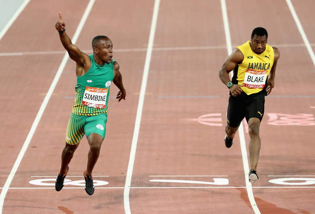 Akani Simbine of South Africa celebrates winning gold in the Men's 100 metres final during the Athletics on day five of the Gold Coast 2018 Commonwealth Games at Carrara Stadium on April 9, 2018 on the Gold Coast, Australia.