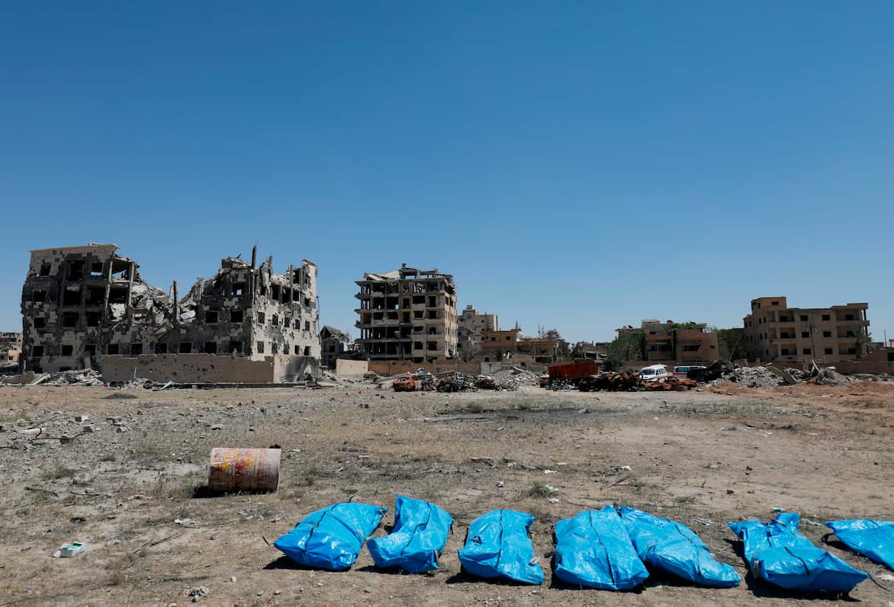 Bodies found in a mass grave in the former Islamic State group stronghold of Raqqa in Syria.