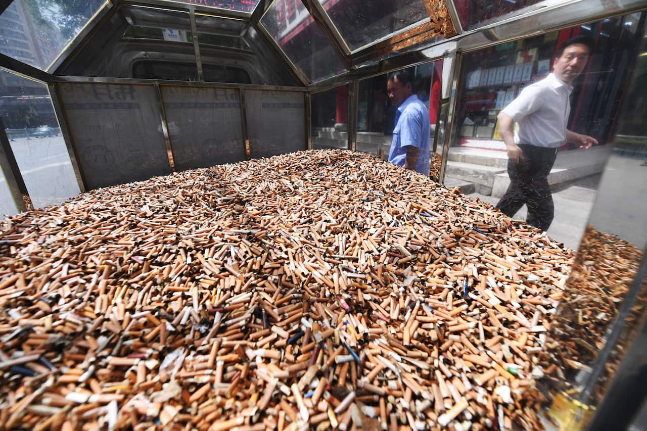 Thousand of cigarette butts showed to recall people not drop it carelessly