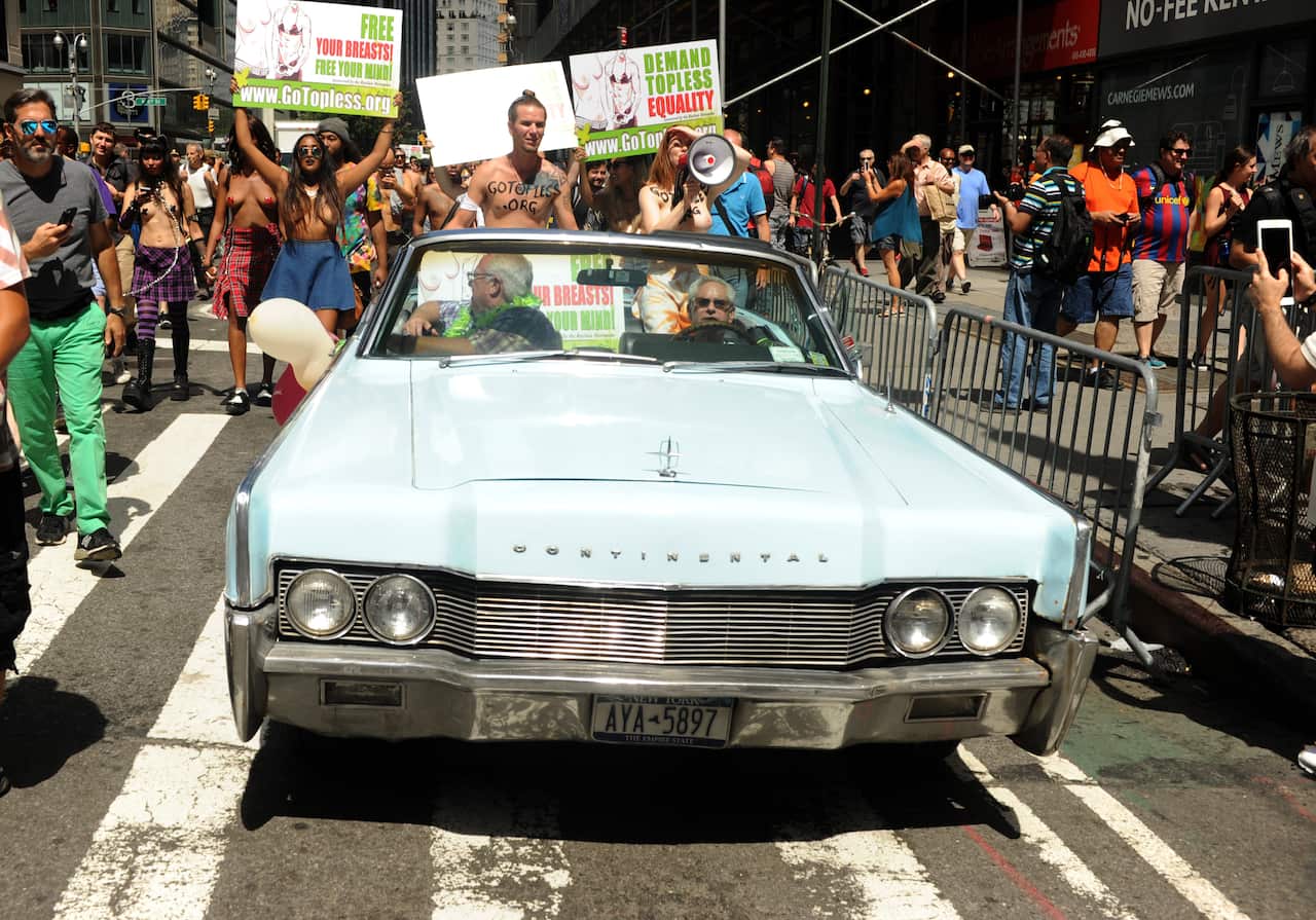 Participants move down the parade route at the GoTopless Pride Parade as part of the worldwide Go Topless Day campaign in New York City, NY, USA, on August 23, 2015. Photo by Dennis van Tine/ABACAPRESS.COM