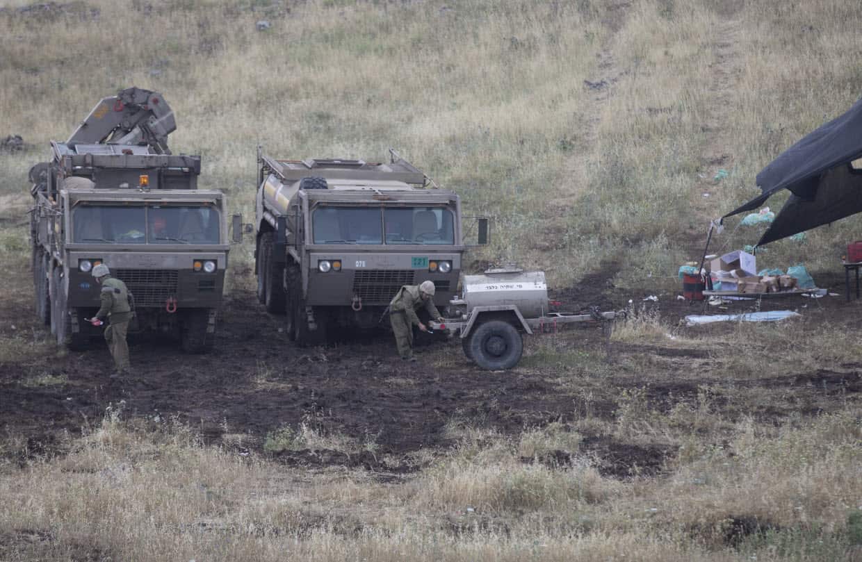 Israeli soldiers are deployed near the Israeli-Syrian border in the Golan Heights, May 9 2018.
