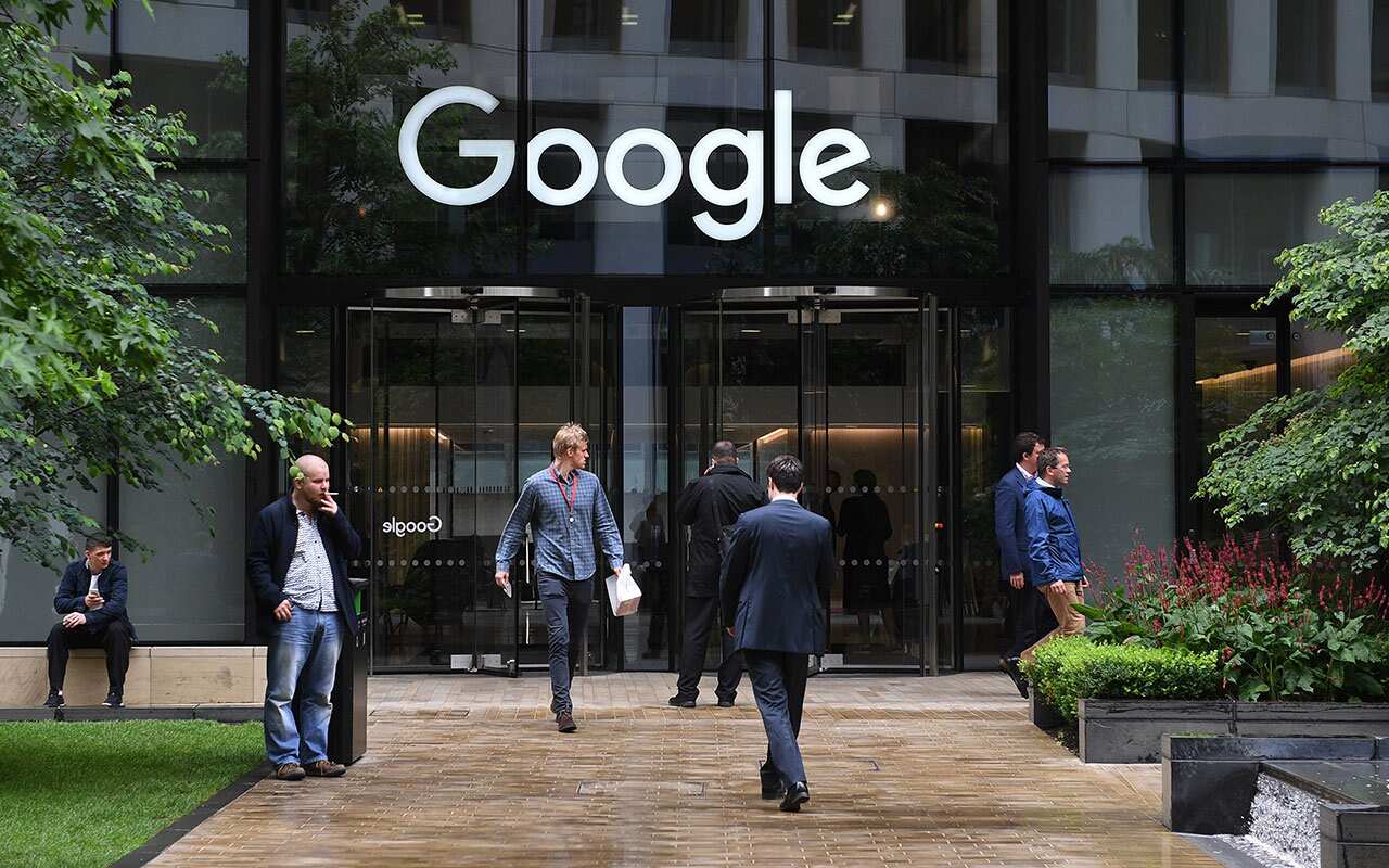 Pedestrian walk past by the Google office in London, Britain, 27 June 2017.