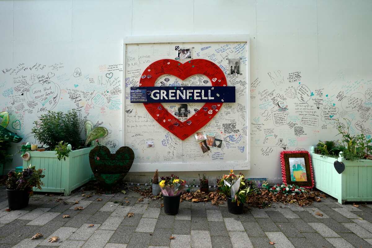 A wall showing tributes to victims close to the Grenfell Tower.