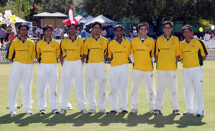 Runs in the Family: Hameed with brother Waheed (Hameed 2nd from right back row, Waheed 3rd from right back row) at the Cricket Masala Festival (Supplied)