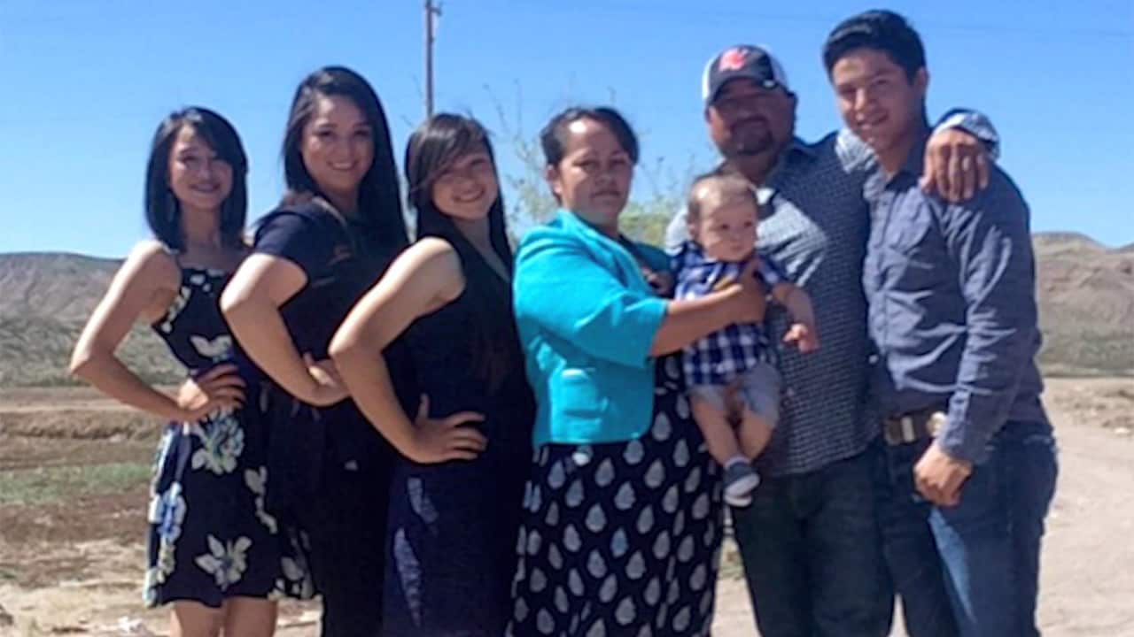 Nadia (second left) with her family.