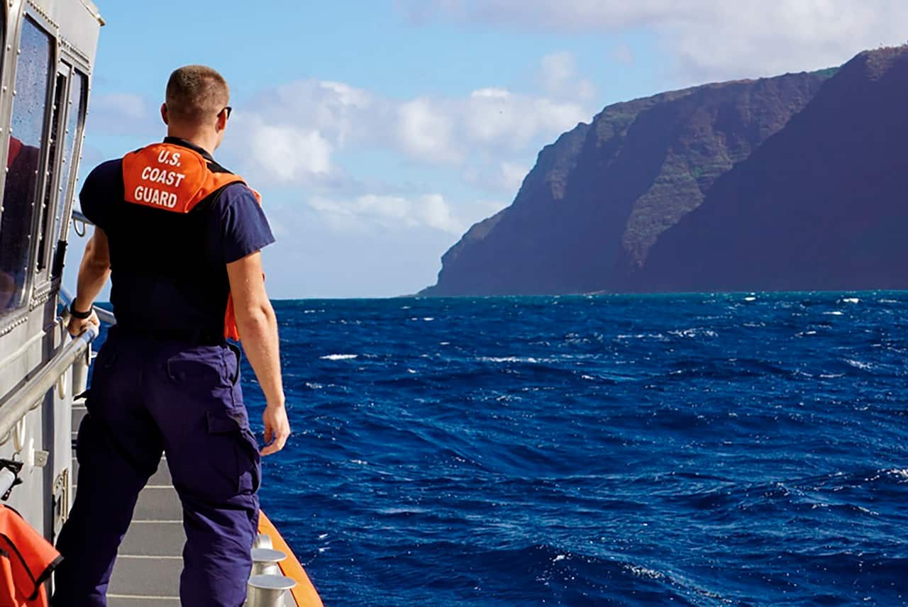 A US Coast Guard cutter off the coast as part of the air and sea search.