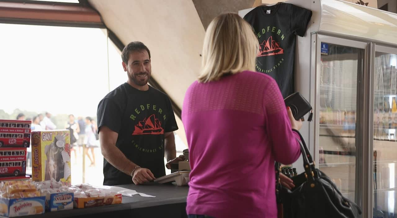 Hazem serves customers at his pop up location at the Opera House during Binge Fest in December 2017.