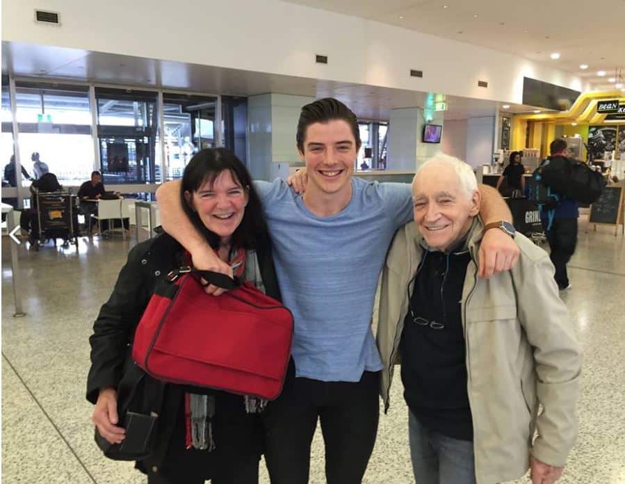 Mat Bertrand with his mother and father at Sydney International Airport.