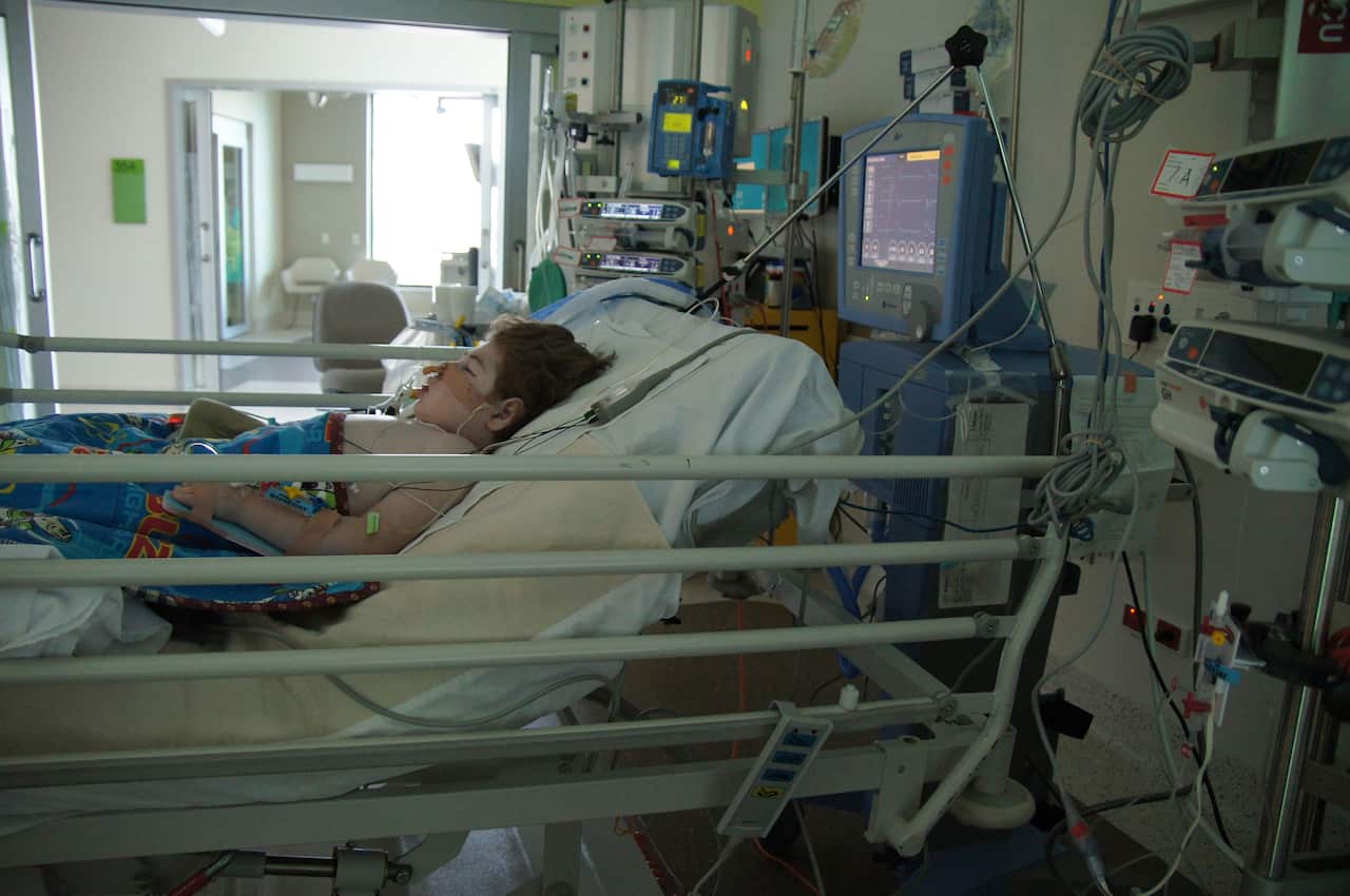 Henry Holmes in hospital.