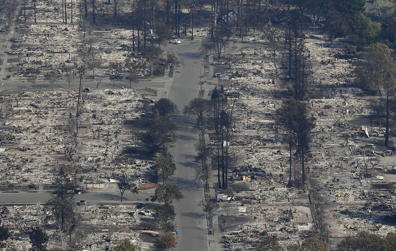 Homes destroyed from fires are seen from an aerial view in Santa Rosa, Calif., Wednesday, Oct. 11, 2017. 