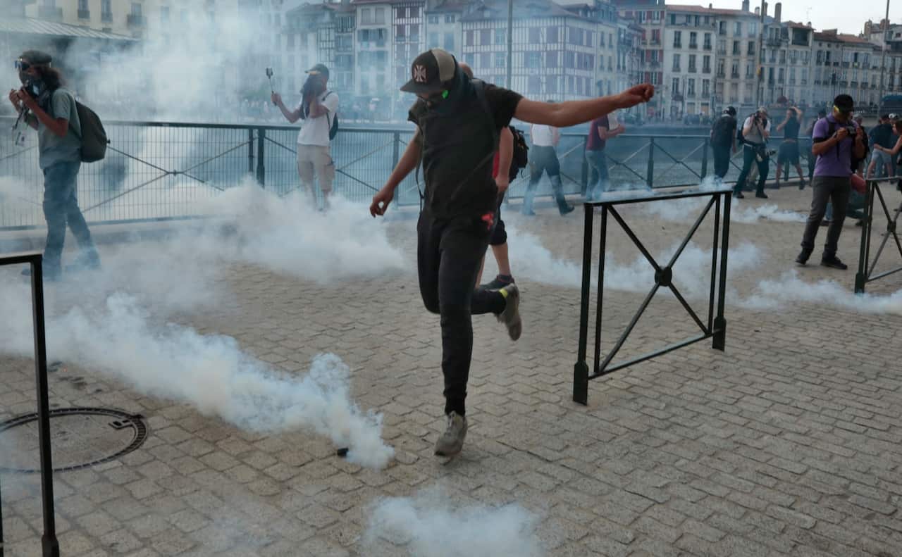 After an undeclared demonstration clashes broke out between protesters, Black bloc and riot police in Bayonne, near Biarritz, France, August 24, 2019