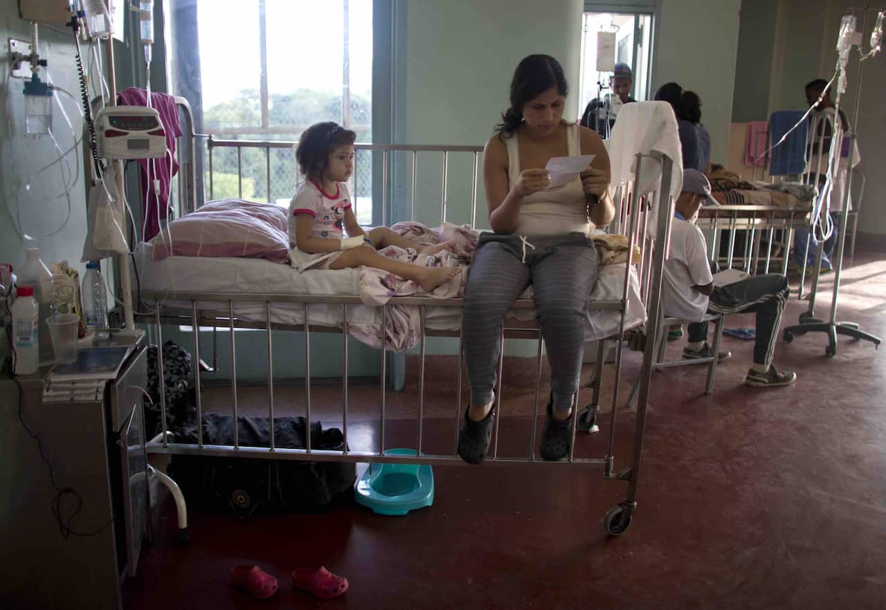 Three-year-old Ashley and her mother Oriana at a Caracas hospital in 2016.