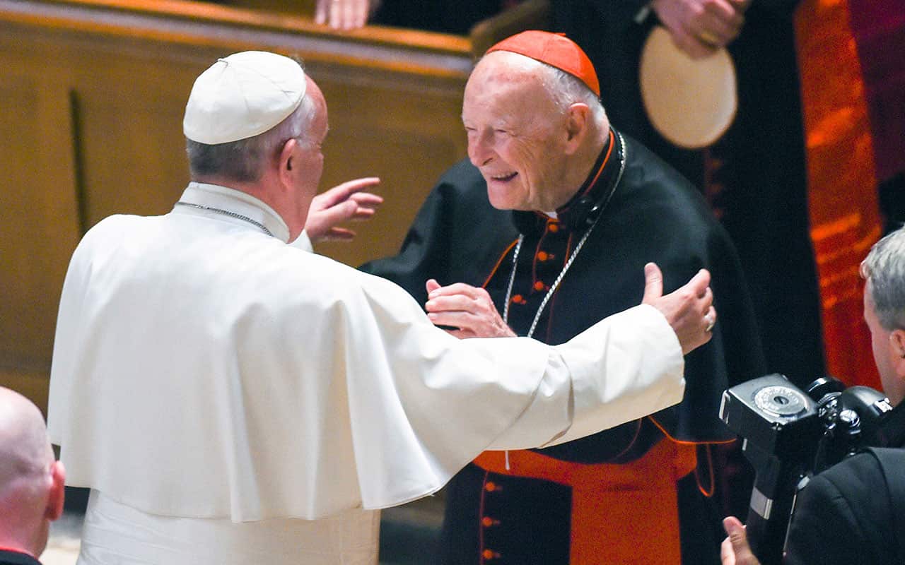 2015 file image of Pope Francis reaching out to hug former Cardinal Theodore McCarrick.
