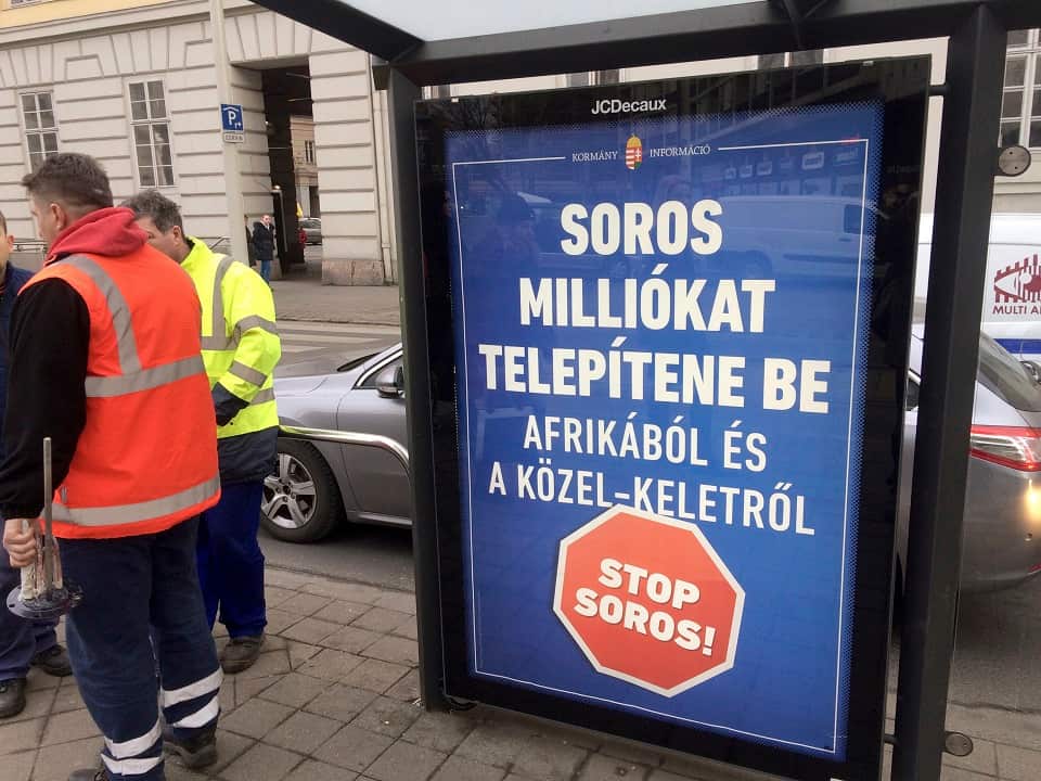 A poster on the streets of Budapestreads: 'Soros would settle millions from Africa and the Middle East. Stop Soros!'