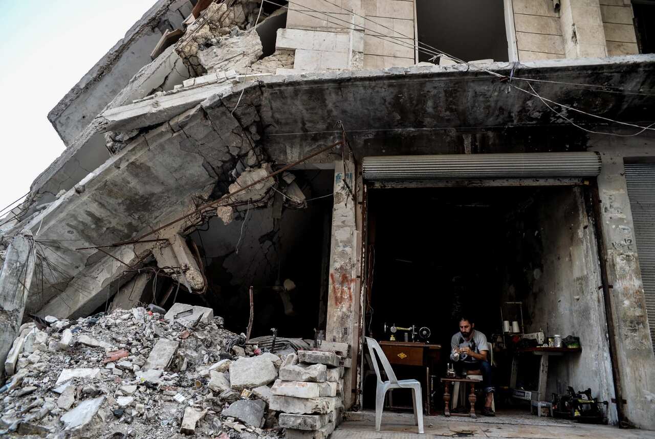 A tailor working in the destroyed building was hit by a reported air strike by Russian air force in the district of Jisr al-Shughur, in the Idlib province