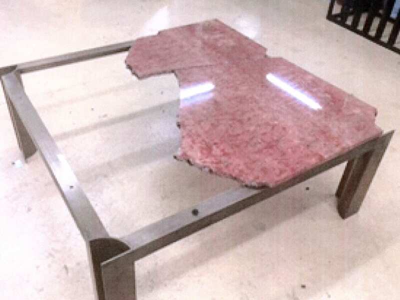 The broken marble table.