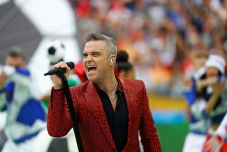 Organiser plays down rude gesture by Robbie Williams at World Cup