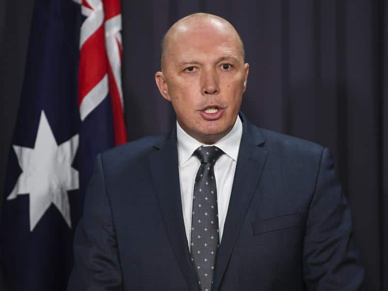 Australian Home Affairs Minister Peter Dutton speaks to media.