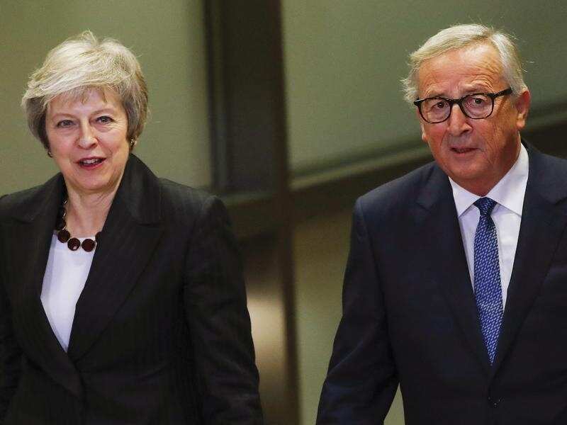 Theresa May meeting with Jean-Claude Juncker in Brussels.