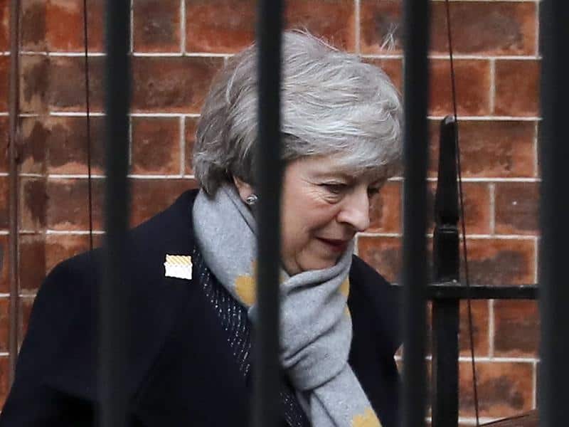 Theresa May leaves No.10 after a cabinet meeting
