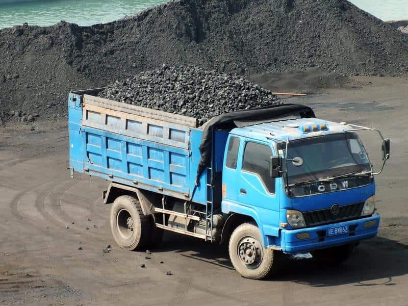 A truck transports coal at the Port of Yichang in central China.