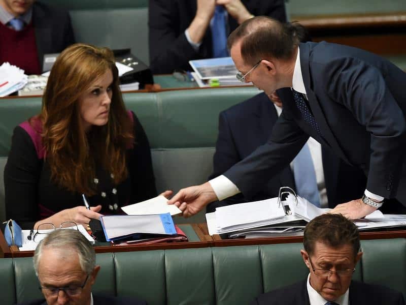 Tony Abbott speaks to chief of staff Peta Credlin in 2015.