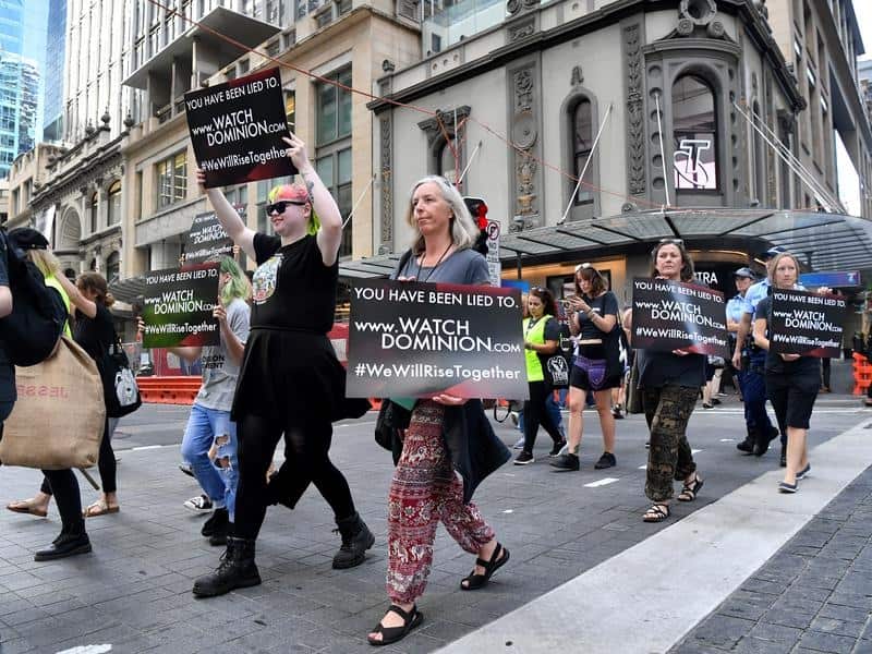 Animal rights protesters march through the business district in Sydney. 
