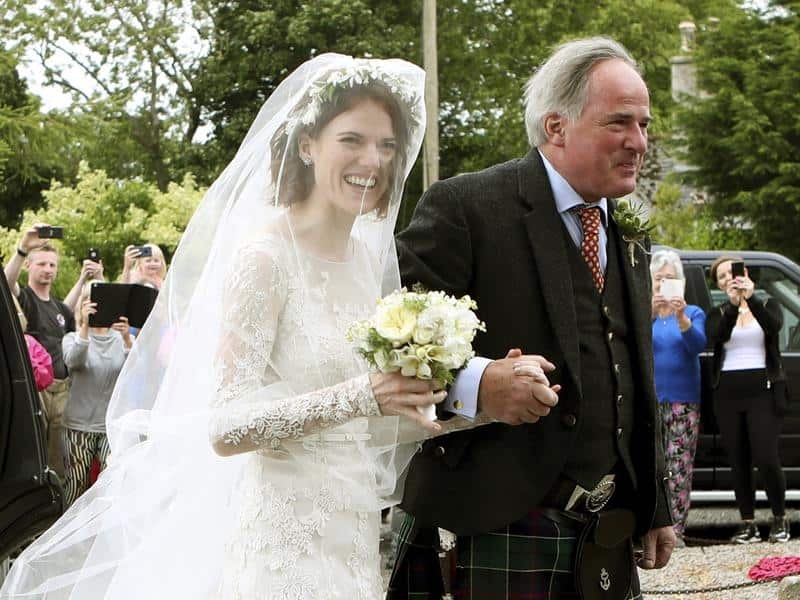 Actress Rose Leslie and her father Sebastian arrive for her wedding