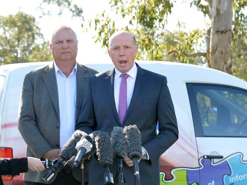 Home Affairs Minister Peter Dutton with LNP candidate for Longman Trevor Ruthenberg.