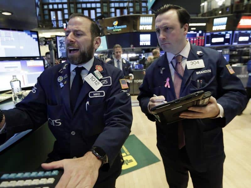 Brokers on the floor of the New York Stock Exchange.