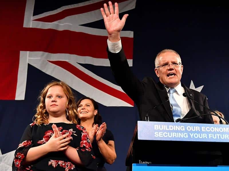 Scott Morrison with wife Jenny and daughter Lily claiming victory.