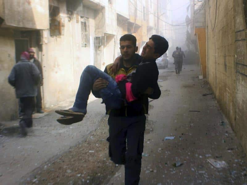 A young man injured in an airstrike on Syria's Ghouta.