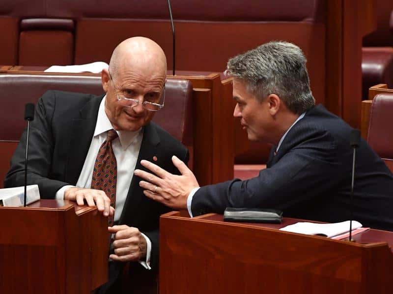 David Leyonhjelm speaks to Finance Minister Mathias Cormann.