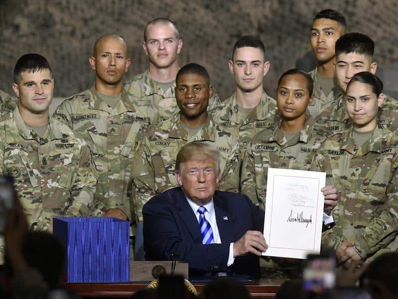 Donald Trump with the John McCain National Defense Authorization Act