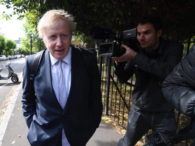 Conservative MP Boris Johnson leaves his house in London.