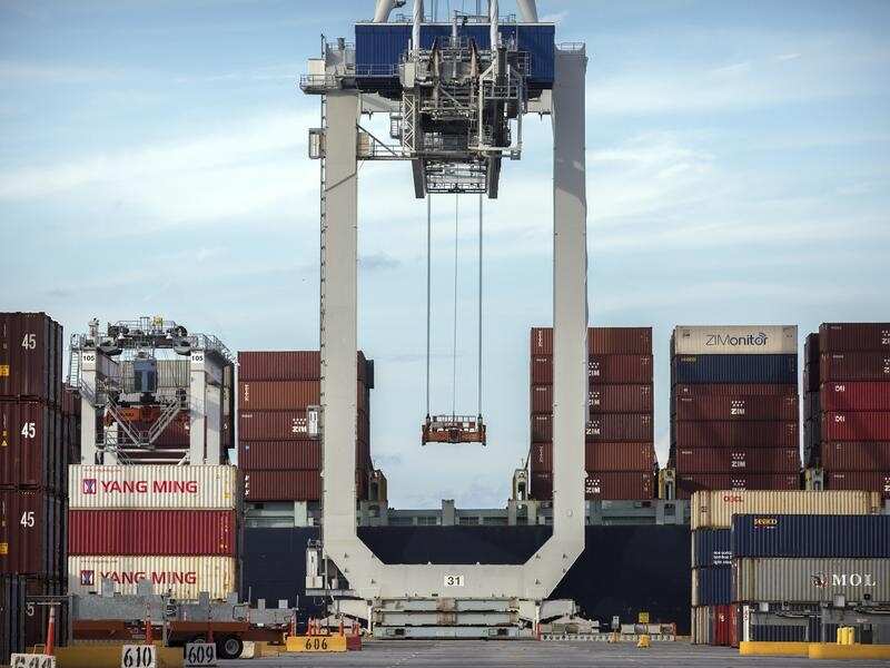 Goods being loaded on a ship.